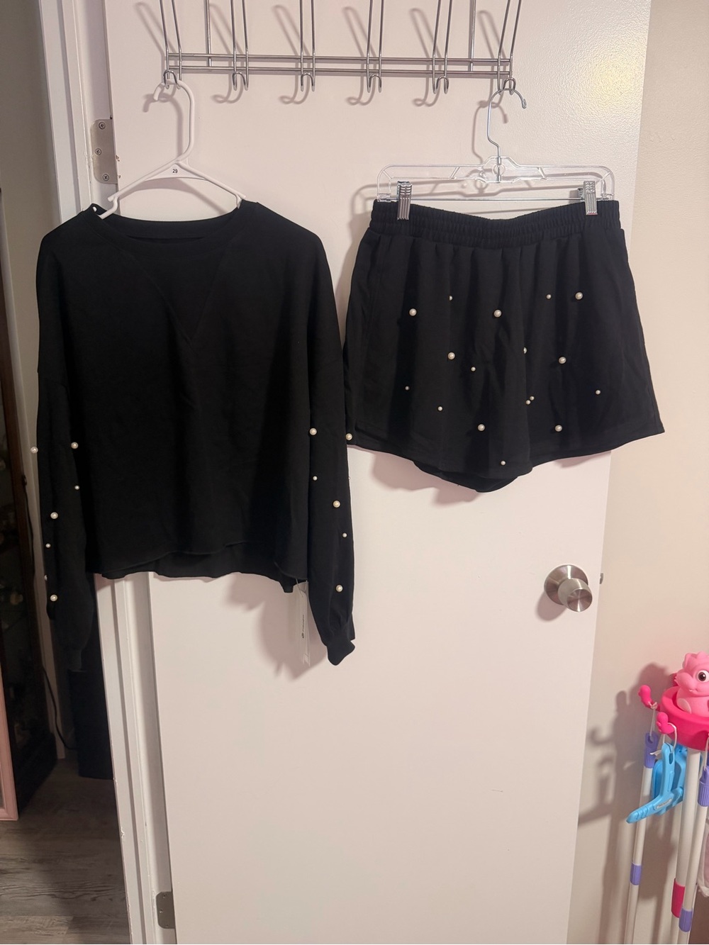 Amazon Black Long Sleeve Crewneck Top and Skort Set with Pearl Embellishments